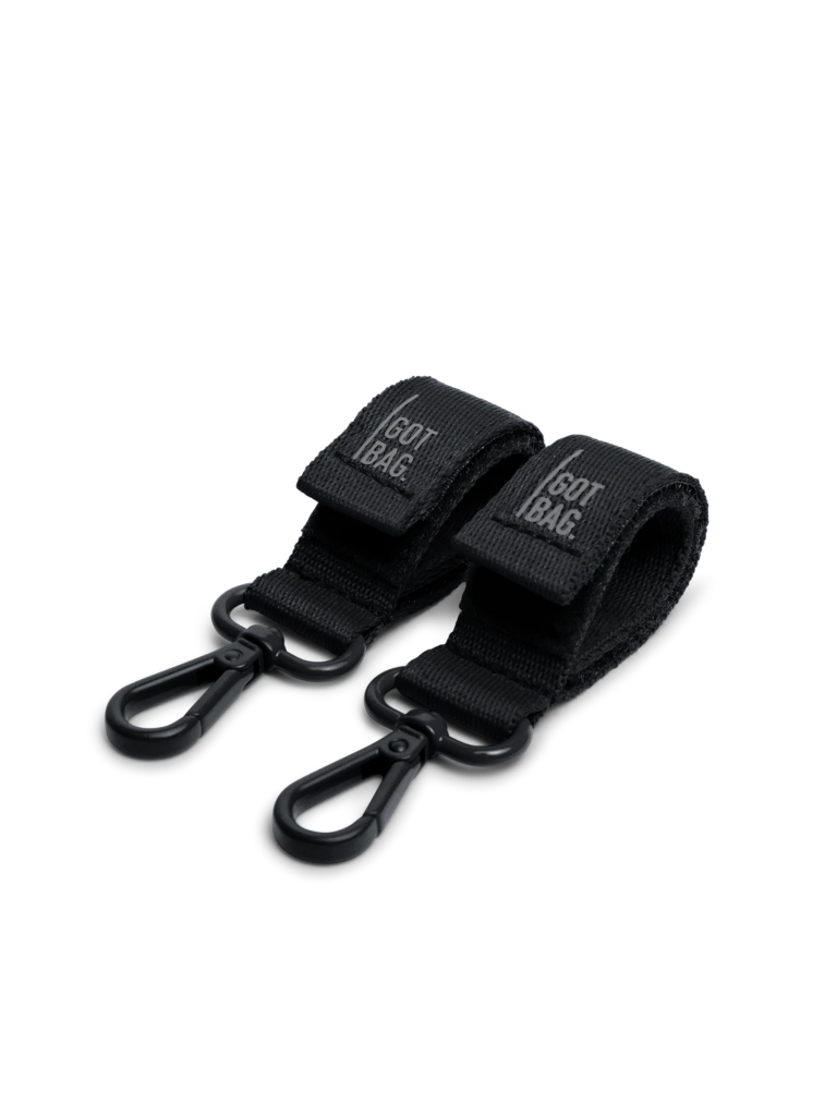 Zwei STROLLER STRAP Accessoires in black (Schwarz) als Studioaufnahme in Frontansicht.