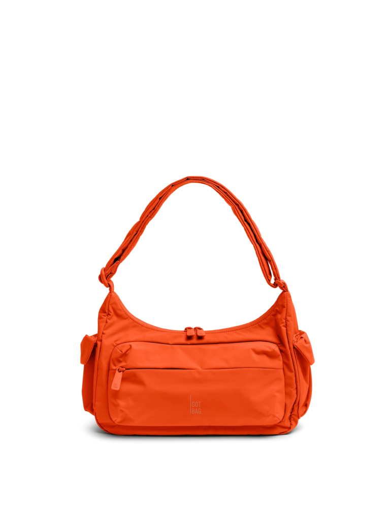 POCKETBAGSMALL Tasche in hot coral (knalliges Orange) als Studioaufnahme in Frontansicht.